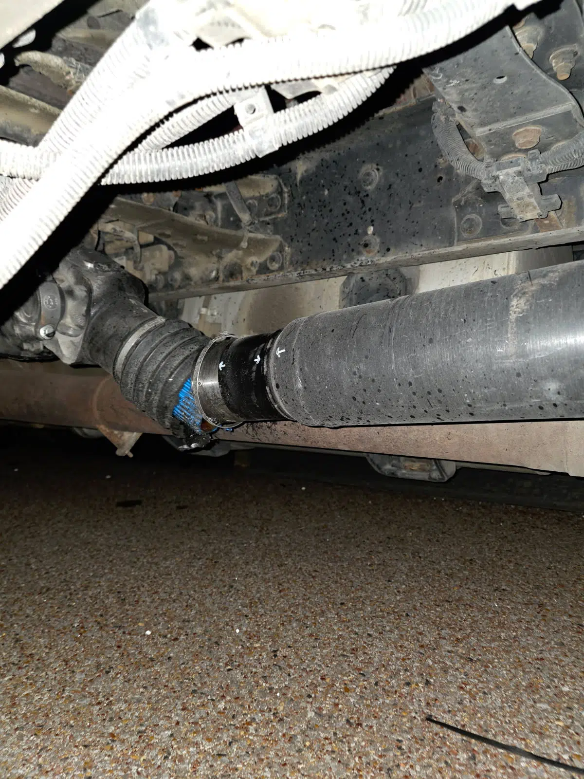 Coolant hose and clamps installed on a truck undercarriage — Rickey Alexander Mobile Truck & Trailer Repair in Forrest City